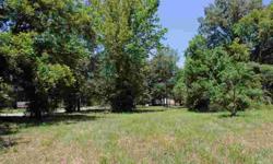 Nice lot w/ trees & a level building spot in Sulphur Rock. Property fronts 2 paved roads and has access to power, water & sewer. It's a great place for a home, duplex or mobile. Mobile homes are welcome but must meet the city of Sulphur Rock's