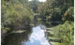 Lot located on the Cosmic Waterway which empties into a small lake - great for canoe or kayak. Location is walking distance to Lamarque School and is in an area of newer built homes.