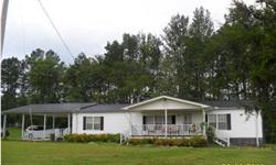 Beautiful 9 acres. Great country living, this home offers a spacious living room, Kitchen equipped with appliances except microwave also including washer and dryer, Dining room combined in Kitchen, 3 bedrooms, Master bath with garden tub, Laundry room off
