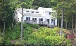 Vintage cottage is part of three-lot subdivision with two brand new houses. Knotty pine interior, front to back master and four other bedrooms (town has three bedrooms). Fully furnished. 150' direct lake frontage on Lake Winnipesaukee. Eligible for