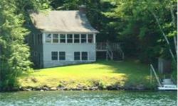 2 BR seasonal cottage situated on a dead end road with 65' shorefront on Little Squam Lake. Paved drive, wooded setting with a nice yard for play. New dock, knotty pine throughout with open concept living area. Beautiful mountain and open water views.