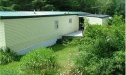This 14x70 mobile home offers both privacy and convenience. Located on its own private lot, yet close to Ashland and I-93. Ideal primary or second home.Many upgrades inside.Owner will help finance down payment.Close to Squam Lakes and hiking in Summer and