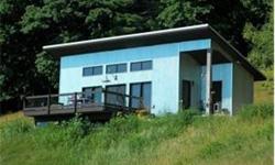 One of a kind hilltop home with spectacular views. Energy efficient contemporary built in a Scandinavian style with a minimalist feel. Great primary home for a couple or single person, great second home or retreat also. Close to skiing, and Lakes and the