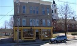 6 residential & 1 commercial/retail unit. 2 car garage under building. Positive cash flow. Building has many upgrades including new electric meters and service panel (2008) and new Weil McClain boiler (2008). Off street parking for tenants. Financial