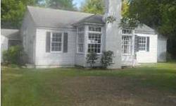 This is a great starter home with wood flooring, sunroom, and sits on 1 acre. Listing originally posted at http