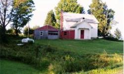 This was an old school house built around 1850 and made into camp-home. It has a nice view of the valley. The house has kit,liv.din,3 br upstairs and bath rooms both floors. Basement has stairs to it with concrete wallskand dirt bottom. On 0.28 acres with
