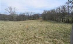 WARREN COUNTY-Views of the Shenandoah National Park from this 10 acre lot in an upscale gated subdivision. Paved roads, underground utilities and lake access . $200.00 per year for road maintenance & common area maintenance. Seller is a builder and can do
