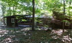 Make This Your Get-A-Way - Small wooded lot in Coolfont where you can enjoy the community ammentites: tennis court, swimming pool, community barn. This contempoary home comes completely furnished and features: kitchen - dining area with wood burning