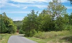 2.84 acre wooded home site in Weber Heritage with pretty view and driveway cut in. Subdivision offers paved roads and underground utilities and also has a nice community area with a large pond. It's an ideal location for your new home -- Close to both