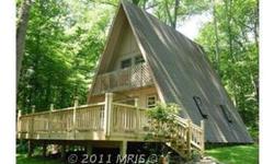 Weekend Get-A-Way - Come enjoy the community access lot on the beautiful Cacapon River plus this cute little A-frame featuring: Great room with gas stove to warm up to, kitchen, bath, bedroom with small balcony overlooking the beautiful 1 acre wooded lot.
