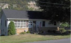 Great location, close to downtown Berkeley Springs. This well taken care of rancher is perfect for the first time homebuyer or retiree. Home boasts 2 bedrooms,2 baths, partially finished walk-out basement, plus wood floors. Great yard but very manageable.