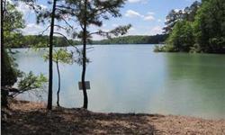 Lewis Smith Lake-Wooded gentle slopping lake lot. Rock shoreline, deep yr. round water, across from the Bankhead Forest, Brushy Creek. Gated Sub. underground utilities, subdivision boat launch, paved roads, HOA Fee per yr ($200.00) 1200 min sq. ft. above