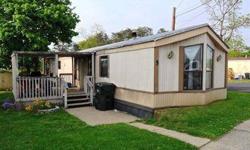 NICE 2 BEDROOM 2 BATH 1989 SINGLE WIDE MOBILE HOME ON RENTED LOT. COVERED DECK & STORAGE SHED. CORNER LOT AND OPEN SPACE IN THE REAR. INCLUDES REFRIGERATOR, STOVE AND DISHWASHER. OIL HOT AIR HEAT. THIS HOME IS IN MOVE IN CONDITION. LOT RENT - $ 454.