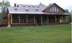 What a package, custom built log home with a 2 bedroom rental unit plus a free standing 1400 sq ft 3 br. 2 bath home, with 2 car garage under. Privately situated on 5.8 acres with a view of the Presidentials and Twins. A small Christmas tree farm has been