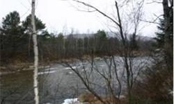 The Perfect Building Lot in Carroll, NH. You can fly fish with 285 feet of frontage along the Ammonoosuc River in the summer and hit the snowmobile trails from your back yard in the winter. Lot is wooded for privacy and in a peaceful subdivision. This lot