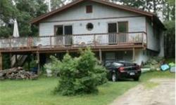 Looking to be close to snowmobiling or skiing in the North Country, take a look at this spacious property which has plenty of room for your family and friends with 3 full baths. The family room is great for relaxing after a day outdoors or cozy up to the