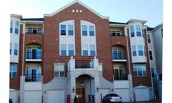 BEAUTIFUL & SPACIOUS CONDO CLOSE TO MAJOR COMMUTING ROUTES, SHOPPING & BLUE RIBBON SCHOOLS! HARD WOOD FLOORS, GARAGE INSIDE OF BUILDING WITH SPACE FOR SECOND CAR, MASTER BR WITH SITTING AREA,CHEFS KITCHEN, FORMAL DINING ROOM, MOLDINGS, TRAY CEILINGS AND