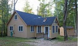 Immaculate Cranmore Shores chalet on .62 acre corner lot on Pequawket Drive with short walk to community beach. 1000 sq ft, but with quality AAA updates and renovations thruout over the past 5 years. Entry to FR with HW floors, lofted pine ceiling,