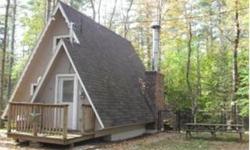 Well maintained fully furnished A-frame with many upgrades. Cozy woodstove insert in brick fireplace for chilly nights. Newer hot air furnace; Rinnai tankless water heater; Fresh paint & retractable screen door. Partially fenced yard & spacious deck.