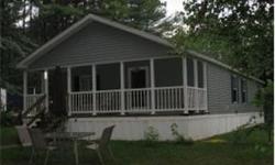 2006 home with 3 bedrooms and 2 bath. Home is 24' x 48' with drywayy, cathedral ceilings, stainless appliances and a fireplace. Farmers porch to sit and enjoy the day. The park occupants enjoy a private beach area on the Saco River as well. Seller is
