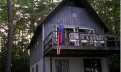 WATERFRONT--TWO+ BEDROOM CHALET, fully furnished, turnkey ready for you! Soft Pine accents the interior of this warm setting, quiet location, with beautiful view to the Pond. Pots and pans included! Great for boating, fishing or just relaxing. Close to
