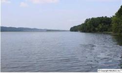 Main Channel Waterfront property featuring approximately 390+/- ft. shoreline, 5+/- wooded acres, good water and gorgeous lake view. Can build boathouse with TVA approval. PROPERTY ON BOTH SIDES OF HWY.
Bedrooms: 0
Full Bathrooms: 0
Half Bathrooms: 0
Lot