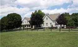 RIVER HILL HIGH DISTRICT! Beautiful farmette in Dayton with pastures,stream,fenced paddocks,and more!In law suite,separate apartment w/2nd kitchen,6 stall horse barn,international riding arena,tack room,run in sheds,in ground pool,patio,screened
