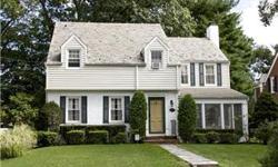 Mint Condition Beautiful Renovated Centerhall Colonial in desirable Green Knolls Neighborhood. New EIK,2 &1/2 New Baths! Beautiful wood floors throughout.Level fenced yard.2car garage. Two 3season rooms! Move in & enjoy! Walk or jitney to Scarsdale train.