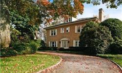 Wide gracious rooms and high ceilings are the hallmark of this stunning brick colonial near Siwanoy Country Club. A home with great warmth yet wonderful space to entertain lots of guests beautifully. Very special property with mature plantings and