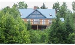 (1534) Custom Log style home overlooking Lake Umbagog abutting the Nation wildlife refuge. Fully furnished. (see list of items NOT INCLUDED) Snowmobile trail access. Just min. to the Balsams or Sunday River ski areas. Brick Fireplace. Handmade log