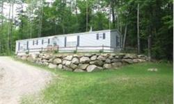 Like new 2 bedroom Maple leaf 16 x67 manufactured home on your own land. Well landscaped with private backyard patio, The home is very light and features large master bedroom with bath, open concept kitchen/dining area, spacious living room. Air