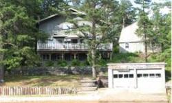 Unique, Spacious ,Ossipee lakefront, features large living room with wood fireplace, full length deck overlooks the lake and the great sandy beach. Good sized bedrooms,( master has 2 walkin closets) finished walkout lower level has a huge family room with