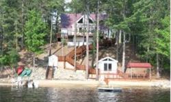 Stunning Ossipee lakefront contemporary in like new condition with beautiful views of Broad Bay and westerly exposure. Enjoy the awesome sunsets from the spacious 3 season glassed in porch. The home has a large living room with fieldstone hearth and