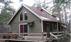 LAKE OSSIPEE VILLAGE. Large corner lot. Privacy plus convenience to beach club located on Ossipee Lake's Broad Bay. All season home with beautiful custom wood interior. Spacious deck and farmers porch, just relax and enjoy this special getaway. Good sized