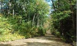 LOCATED ON THE HIGH SIDE OF A QUIET COUNTRY ROAD,GENTLE TERRAIN, PRIMARILY HARDWOOD FOREST, SOUTHERN EXPOSURE, PRIVACY,A PORTION OF THE LAND IS IN CURRENT USE TAXATION.VIEW POTENTIAL POWER AT STREET. MORE LAND AVAILABLE. 15 MINUTES TO RAGGED SKI AND GOLF.