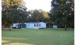 Bring your animals this well maintained 4b/2b manufactured home. Sits on 9 acres with paved rd frontage only a short drive to the turnpike. The home features an open floor plan & split bedrooms. Wood laminated flooring and carpet throughout the home.