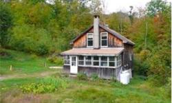 Rare find in Southeastern Vermont! 94.5 acres of fully accessible hardwood forest plus a two bedroom year round camp equipped with gas heat, electricity and drilled well. An extensive recreational preserve with numerous hiking trails stretches up the