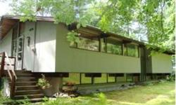Distinctive & delightful Deck house: Set amidst the trees of the Pine Drive neighborhood with surprising privacy for being mere steps away from a popular school bus stop. Easy access to Balch Hill trail network and a 5 minute bike ride to schools and