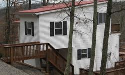 Enjoy Rough River Lake year round in this agent/ owned, FURNISHED 2-Bedroom lake view home is located in Four Seasons Subdivision on Rough River Lake! Property has 3 LOTS. Central heat and air, a boat dock (transferable with COE approval). MOTIVATED