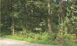 Great country homesite of almost 4 ares, heavily wooded - with many hardwood trees! Primarily level, and approved for an on-site septic system. The abundant wildlife and natural beauty are remarkable. Houseman Road is rustic, yet surprisingly convenient,