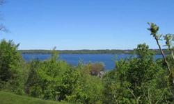 Amazing views of Lake Leelanau from this parcel! -- Gorgeous Lake Leelanau views from this prime building site in an established neighborhood of nice, newer homes. -- Located on a quiet, county maintained, paved road just outside of Traverse City, this is