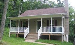 Enjoy the covered front porch of newer 2 BR, 1 BA home. Built in 2008, home is less than 1 mile from Freezeland Rd & set on a .46 acre pvt lot backing to trees. The walk out basement w/ French doors has a full bath R-I & room for future bedroom, rec.