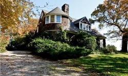 Rambling waterfront compound designed by McKim, Mead & White. This Shingle style grand cottage in the style of Stanford White has been left untouched and is being sold as is.Its exquisite details remain intact including 7 original fireplaces, original