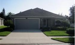 Absolutelty beautiful and well maintained Lennar Grand Villa. Tile and laminate floors in all room except for the two guest bedrooms. Corian counters in the kitchen. The original back patio has been finished to a family room & it is lovely plus there is a