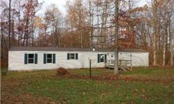 Looking for peaceful seclusion? This manufactured home sitting back from the road on five wooded acres just may be the answer. 3 bedrooms, 2 baths, split floor plan, large living room, open kitchen/dining area and large master suite with big garden tub in