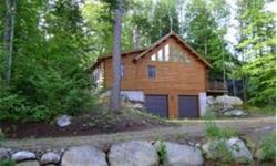 Moultonboro, NH. Gorgeous Katahdin Log Home In Suissevale on large lot. Lightly used home has it all including: gas stove, hardwood flooring, granite countertops, cathedral ceilings, over sized 2 car garage & kitchen island, 4 season porch, anderson