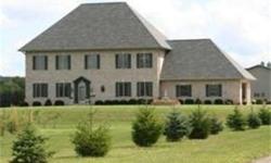 Custom built executive estate on 35 acres. All brick exterior w/brick quoin corners. 10' ceilings & plaster walls. Granite countertop & custom hickory cabinets outline a country sized KIT. 11 hydronic heating zones. Finished LL w/KIT would make a great