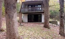 A great wooded escape that is just steps away from your own 40 feet of frontage on Whitewater Lake. With 3 bedrooms and 2 baths, a large living room and kitchen, this is the perfect spot to enjoy a peaceful weekend or you can party with your friends and
