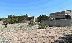 Sweeping Sandia, Ortiz and Cerrillos Mountain views from home, studio and gardens. Flexible open plan, split bedroom design with high ceilings and tiled floors throughout creating a light and spacious easy living home. Built by Leif Backe with his hand