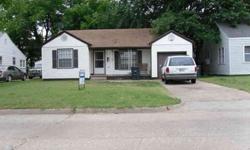 Located south of the Oriignal Enid High School & track grounds, easily accessible to business districts & N?S Van Buren Ave in Enid, Ok.....central heat & air, tiled floors thruout.. large addon to back of home could be used as 2nd living area/rec/ media